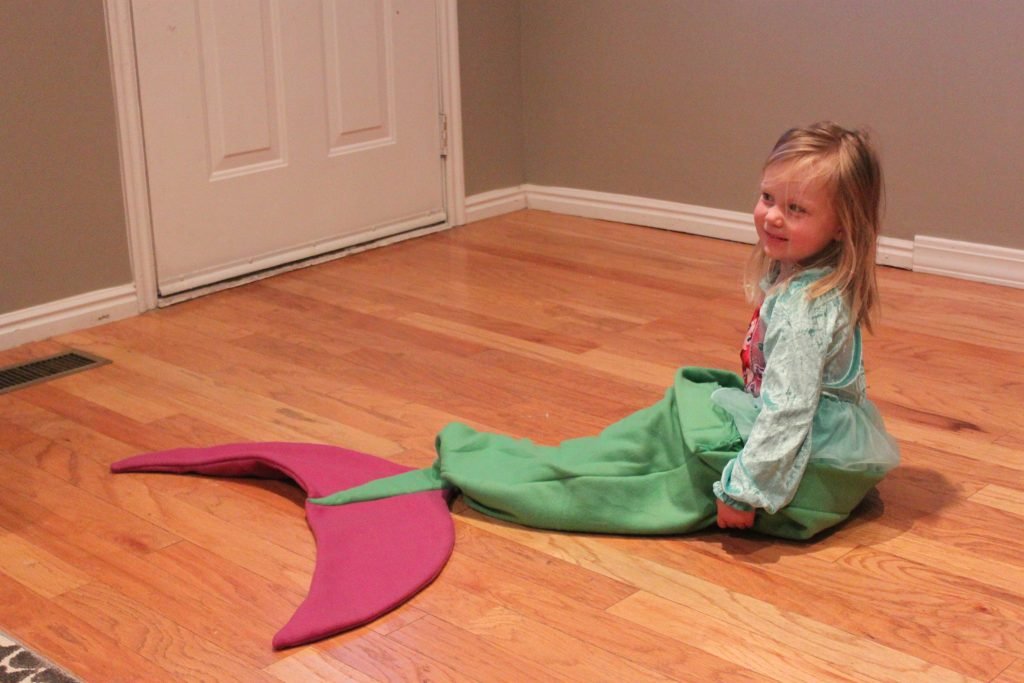 I made this mermaid tail for Fay. The cutest thing ever is when she has somebody hold her so that she can kick like a mermaid!