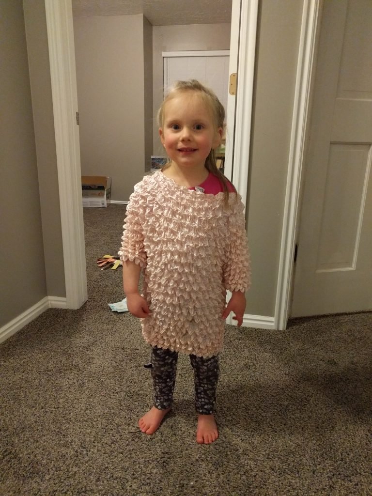 Aunt Christina gave this ... Item of clothing(?) to Fay when she was born 6 weeks early to prove that it really is one-size fits all. It still fits. :)