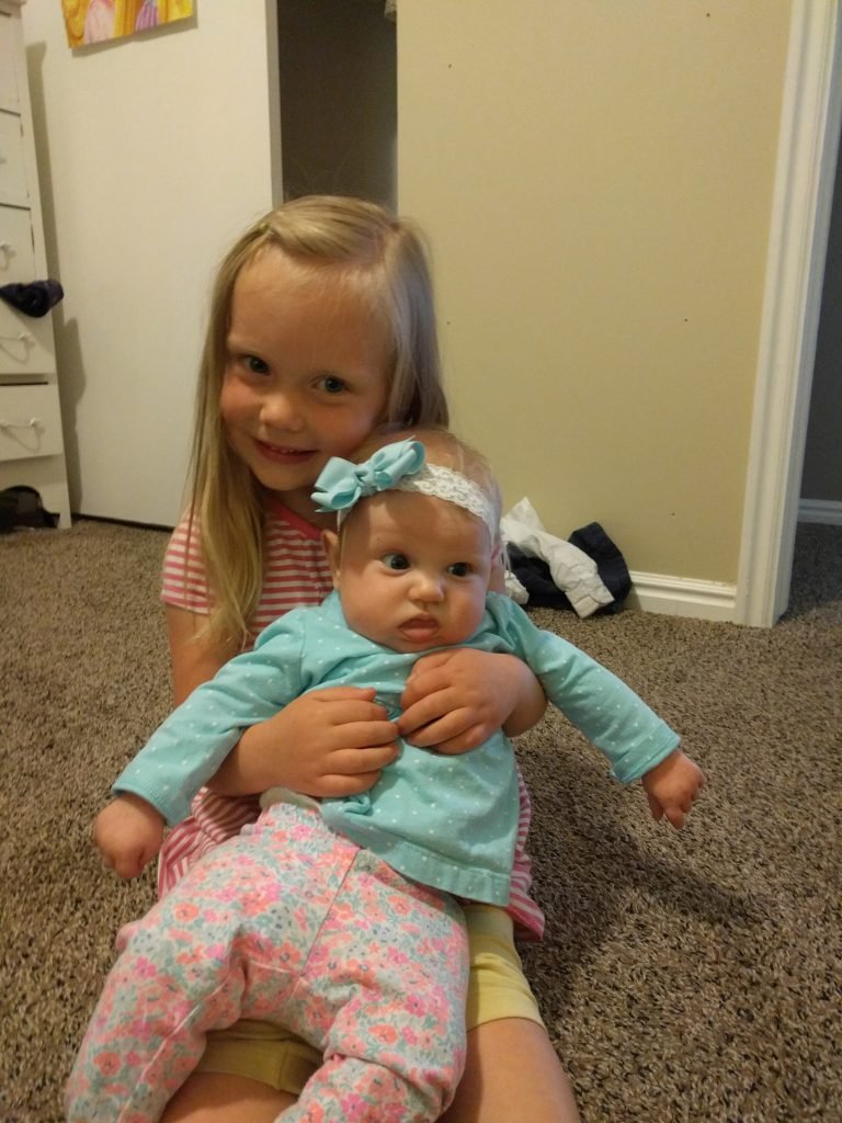 This one was taken a few days ago (though Portia is in the same outfit again). I just thought Fay looked so sweet and Portia looks so funny!