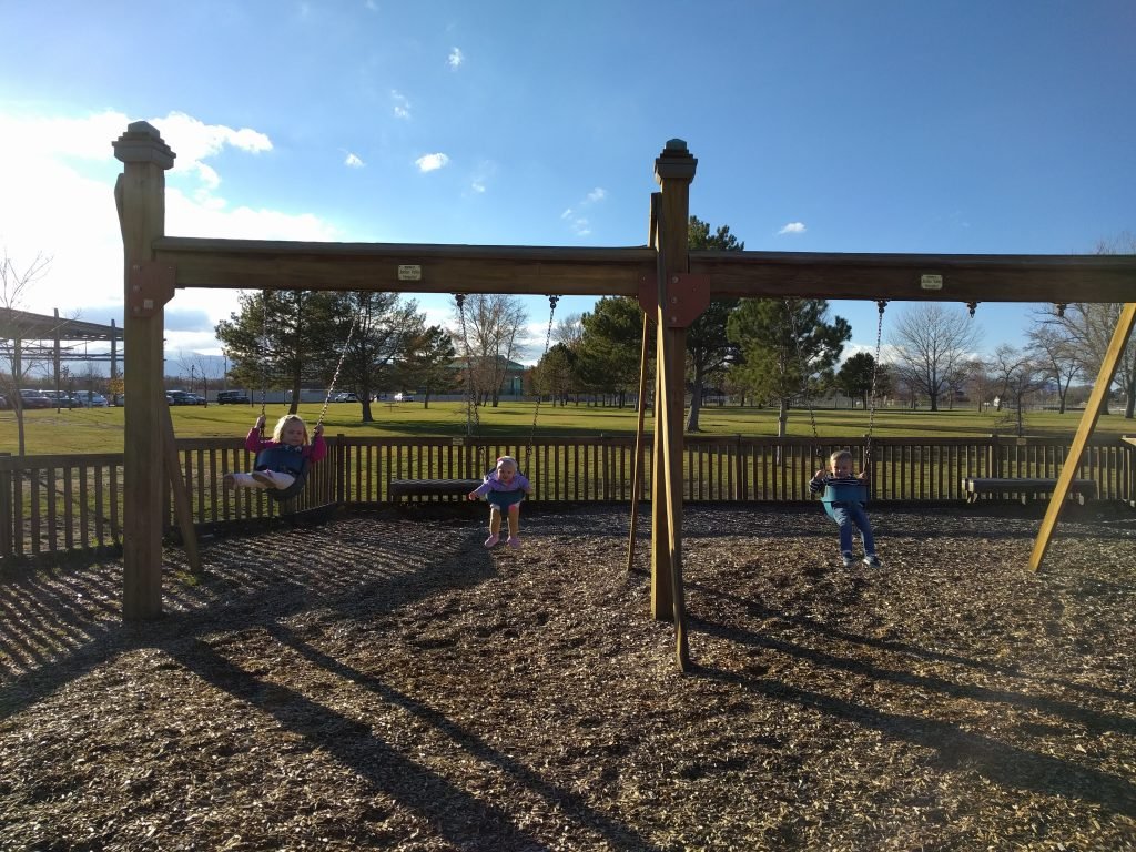 All three on the swings!
